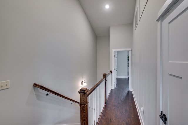 hallway featuring dark hardwood / wood-style flooring