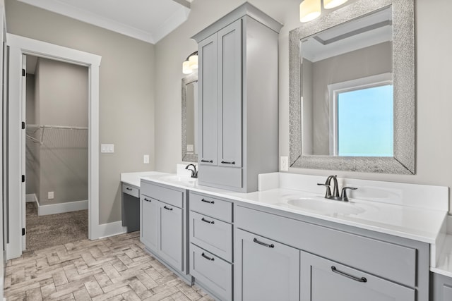 bathroom featuring vanity and crown molding