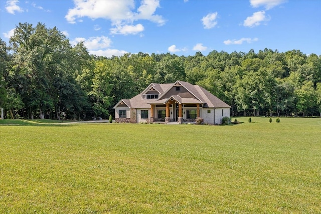 craftsman-style house featuring a front lawn