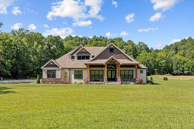 craftsman-style house with a front lawn