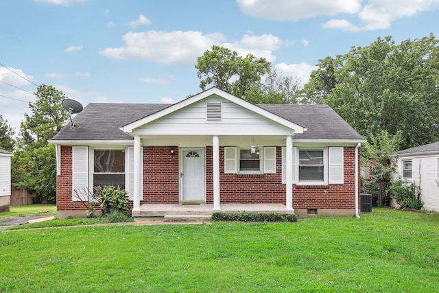 view of front of house featuring a porch, cooling unit, and a front yard