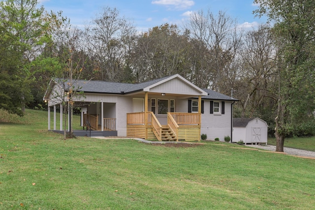 view of front of home featuring covered porch, a front lawn, and a storage unit