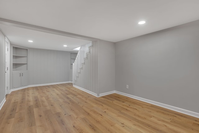 basement with light wood-type flooring