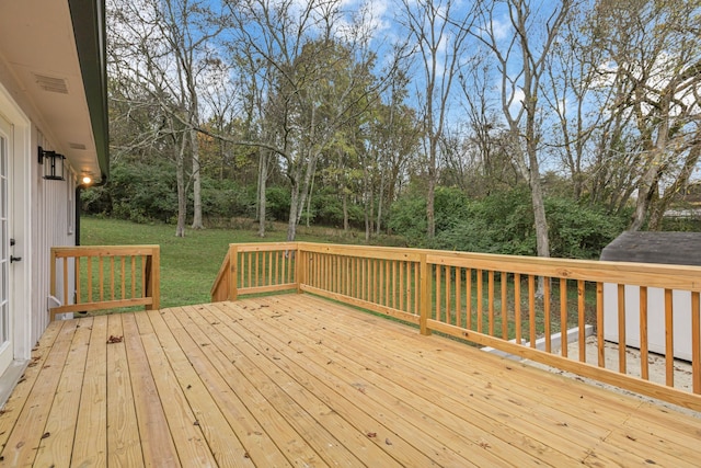 deck featuring a yard