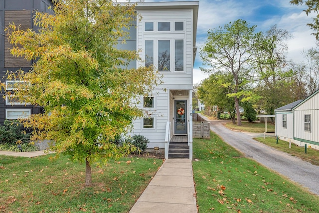 view of front of house with a front yard