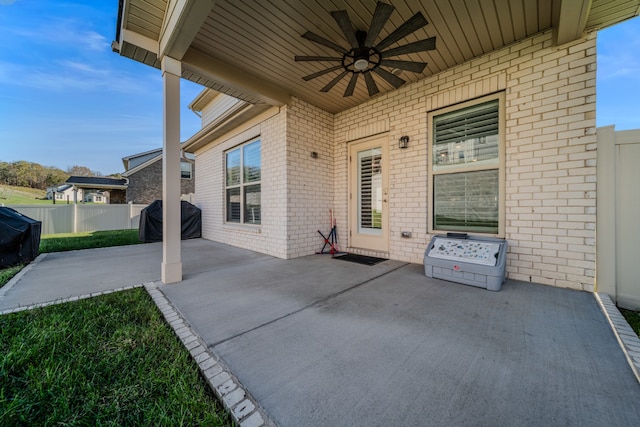 view of patio featuring ceiling fan