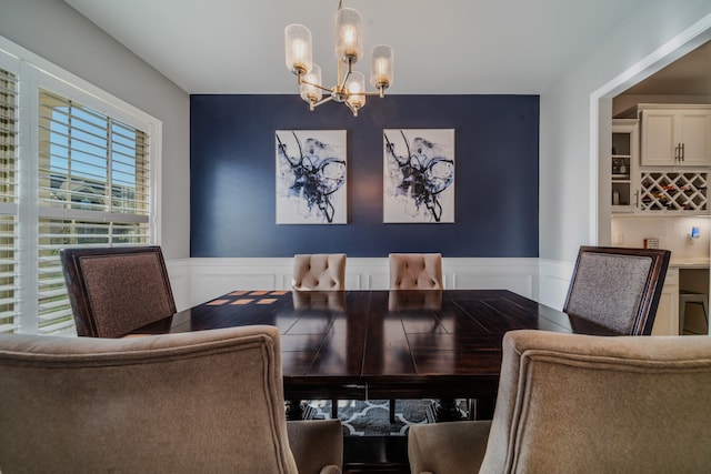 dining area with a notable chandelier