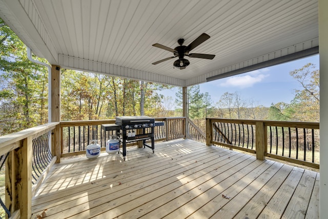 deck featuring ceiling fan and area for grilling