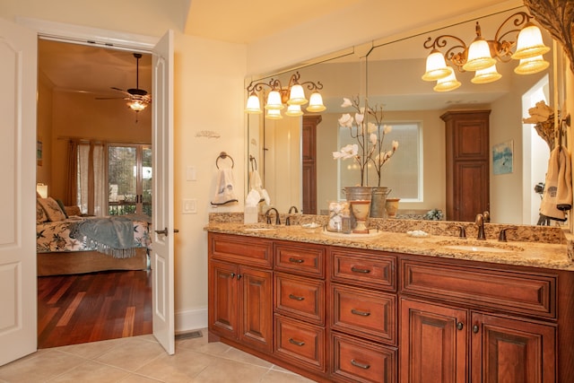 bathroom featuring vanity, hardwood / wood-style floors, and ceiling fan