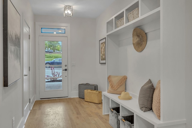 mudroom with light hardwood / wood-style floors