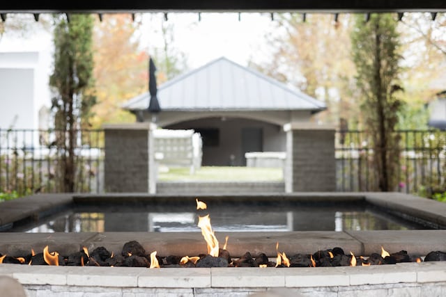 exterior space with a fire pit