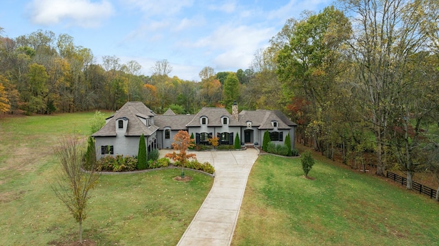 view of front of property with a front lawn