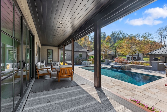 view of pool featuring a patio