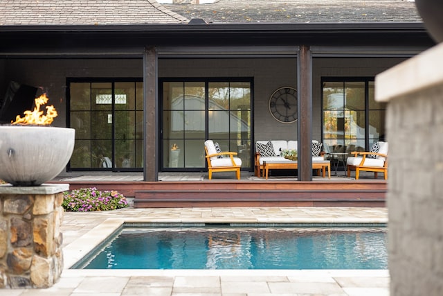 view of swimming pool featuring a patio area