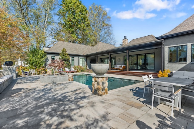 view of pool with a patio area