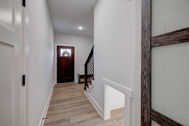 entryway with light hardwood / wood-style floors