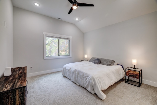 carpeted bedroom with lofted ceiling and ceiling fan