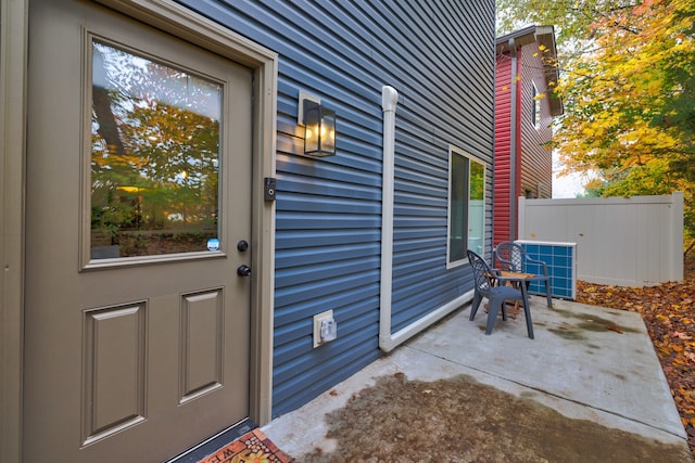 doorway to property featuring a patio area