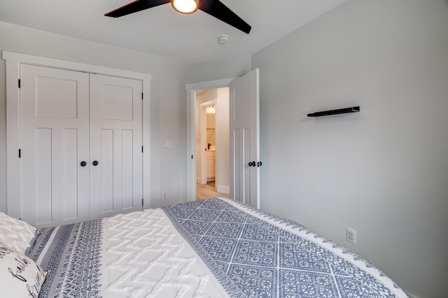 bedroom with a closet and ceiling fan