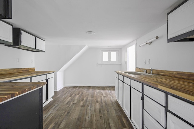 116 Ridge Rd, Chattanooga, TN 37411 - kitchen featuring butcher block countertops, dark wood-style floors, and white cabinets