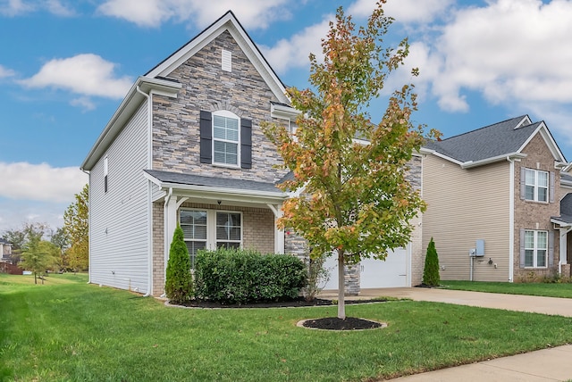 view of front of property featuring a garage and a front lawn