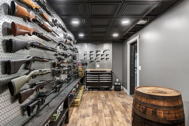 wine area with light wood-type flooring