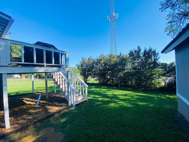 view of yard with a sunroom