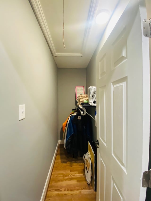 corridor featuring hardwood / wood-style floors