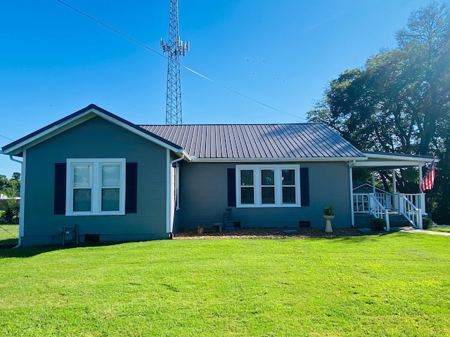 view of front of home with a front yard