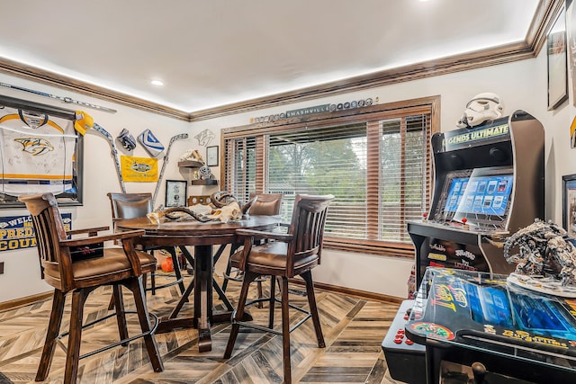 dining room featuring parquet flooring and crown molding