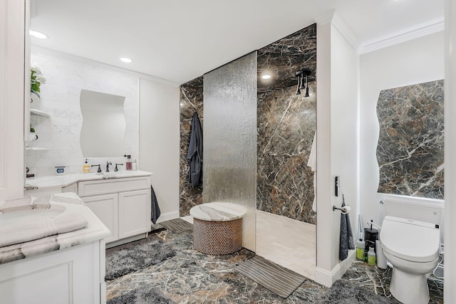 bathroom featuring ornamental molding, vanity, tiled shower, toilet, and tile walls
