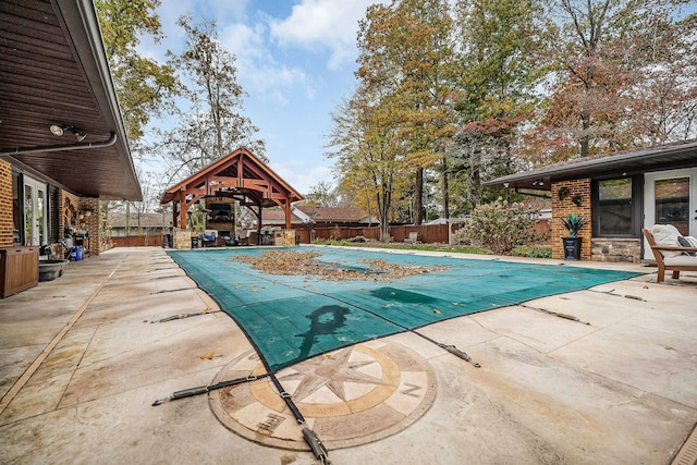 view of pool featuring a patio area and a gazebo