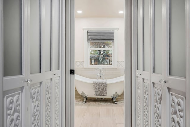 bathroom featuring a tub