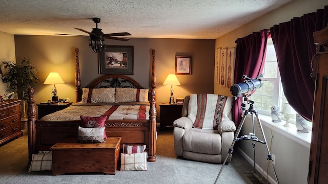 carpeted bedroom with a textured ceiling and ceiling fan