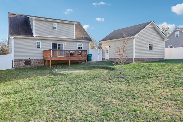 back of house with a lawn, a wooden deck, and central AC unit