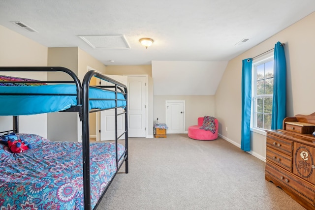 bedroom with carpet and vaulted ceiling