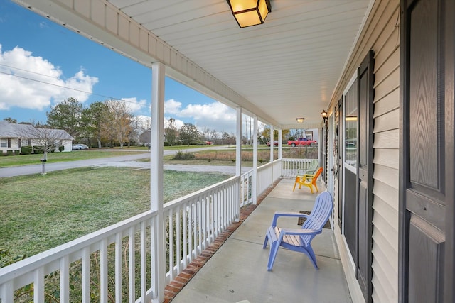 view of patio featuring a porch