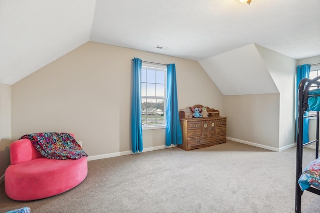 bonus room featuring carpet flooring and lofted ceiling