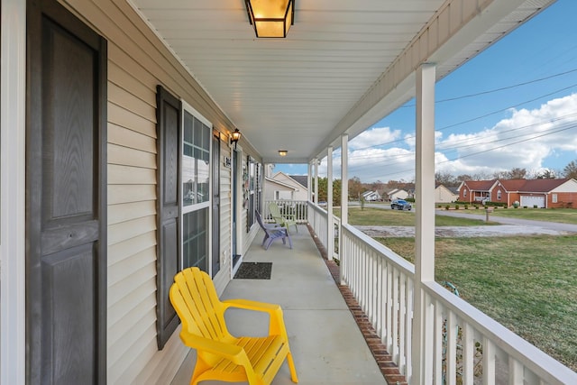 balcony featuring a porch