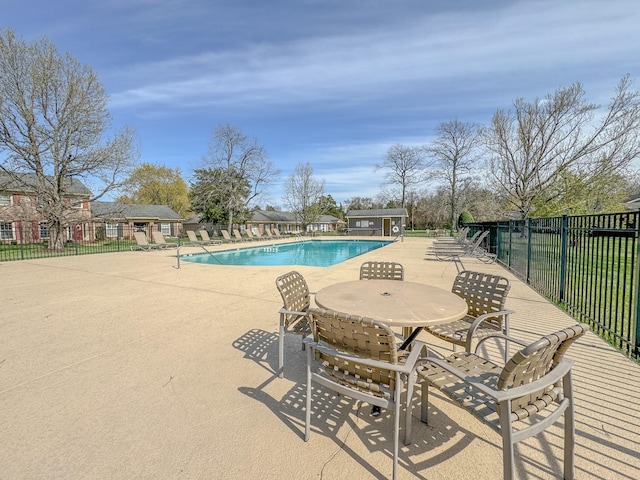 view of pool featuring a patio