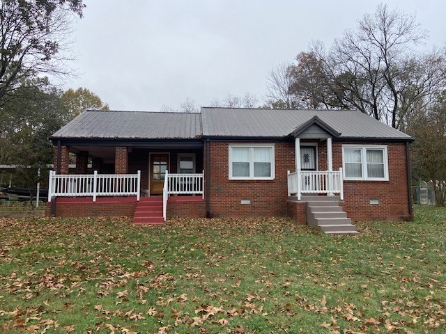 view of front of property with a front lawn and a porch