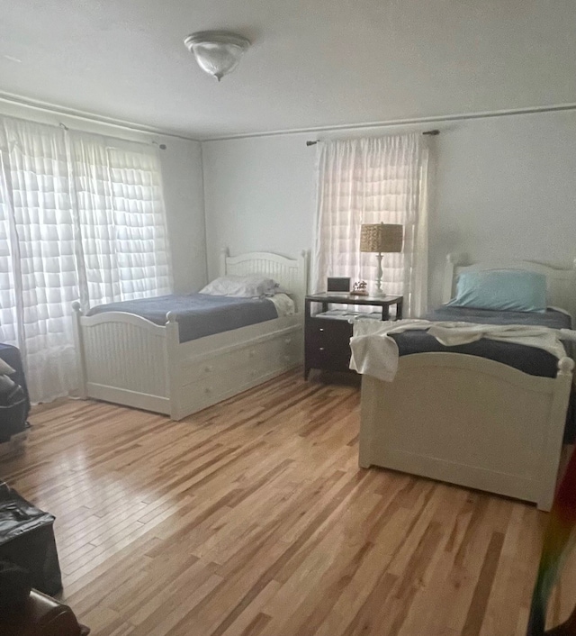 bedroom featuring hardwood / wood-style flooring