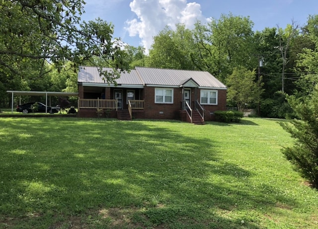 single story home featuring a front yard and a carport