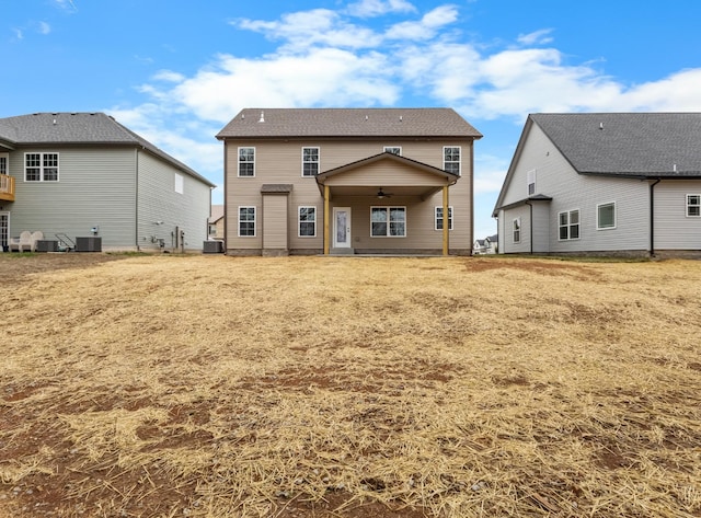 back of house with cooling unit and ceiling fan