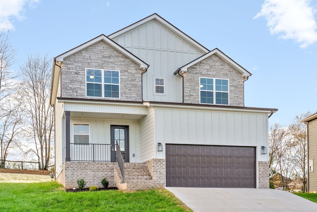 view of front of property featuring a garage and covered porch