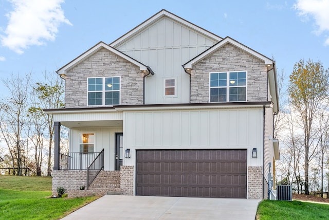 view of front of property featuring a garage and a front yard