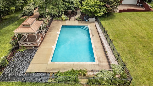 view of pool with a patio area, a lawn, and a gazebo