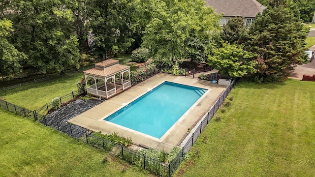 view of pool featuring a patio area, a yard, and a gazebo