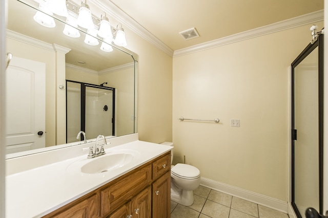 bathroom featuring ornamental molding, vanity, a shower with shower door, tile patterned floors, and toilet