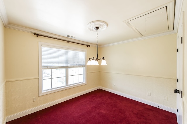 spare room featuring carpet flooring and ornamental molding